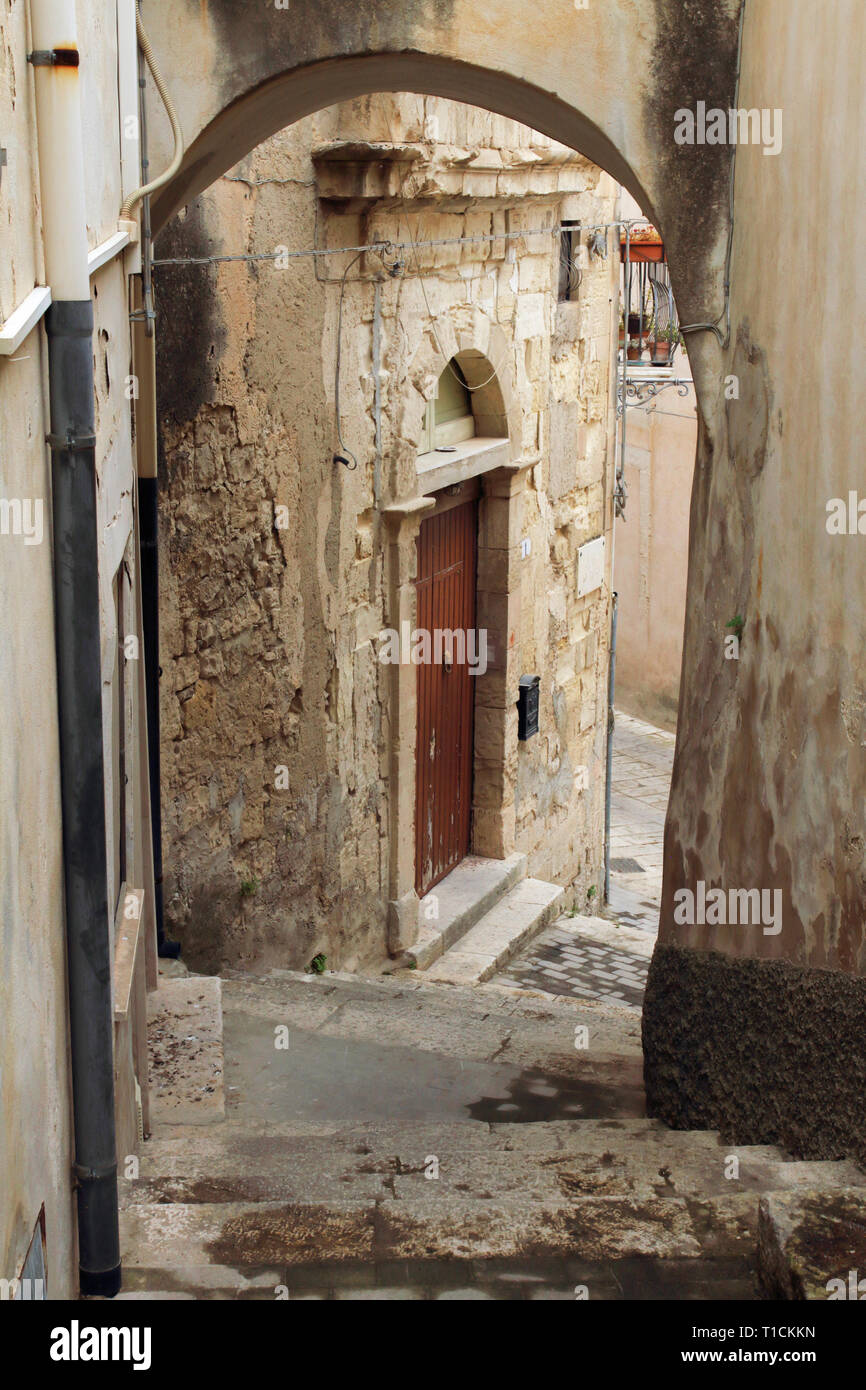 Exploring the side streets and back streets of Ragusa Ibla, the old town's very aged houses and street scenes Stock Photo