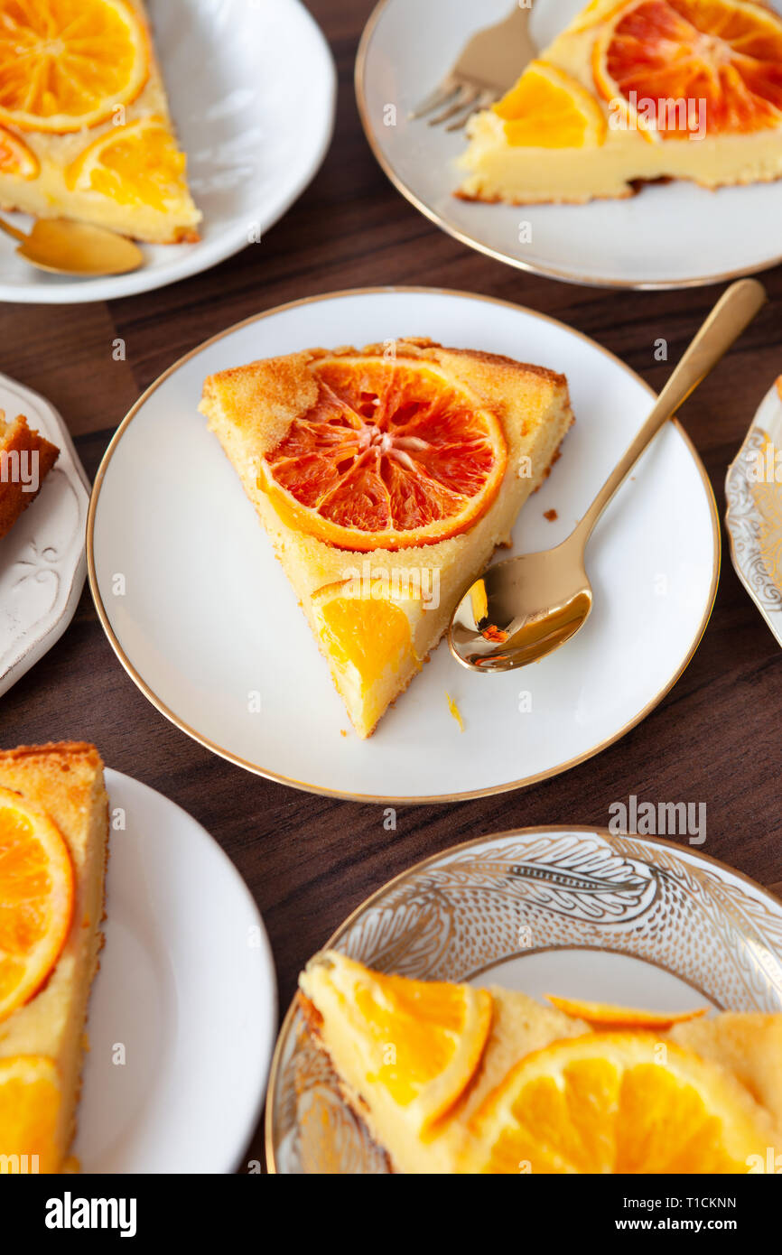 Fruity sponge cake with fresh candied oranges Stock Photo Alamy