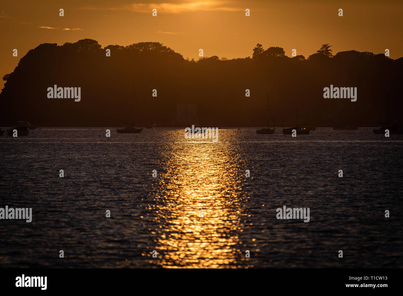 Beautiful sunset boats sea waves hi-res stock photography and images ...