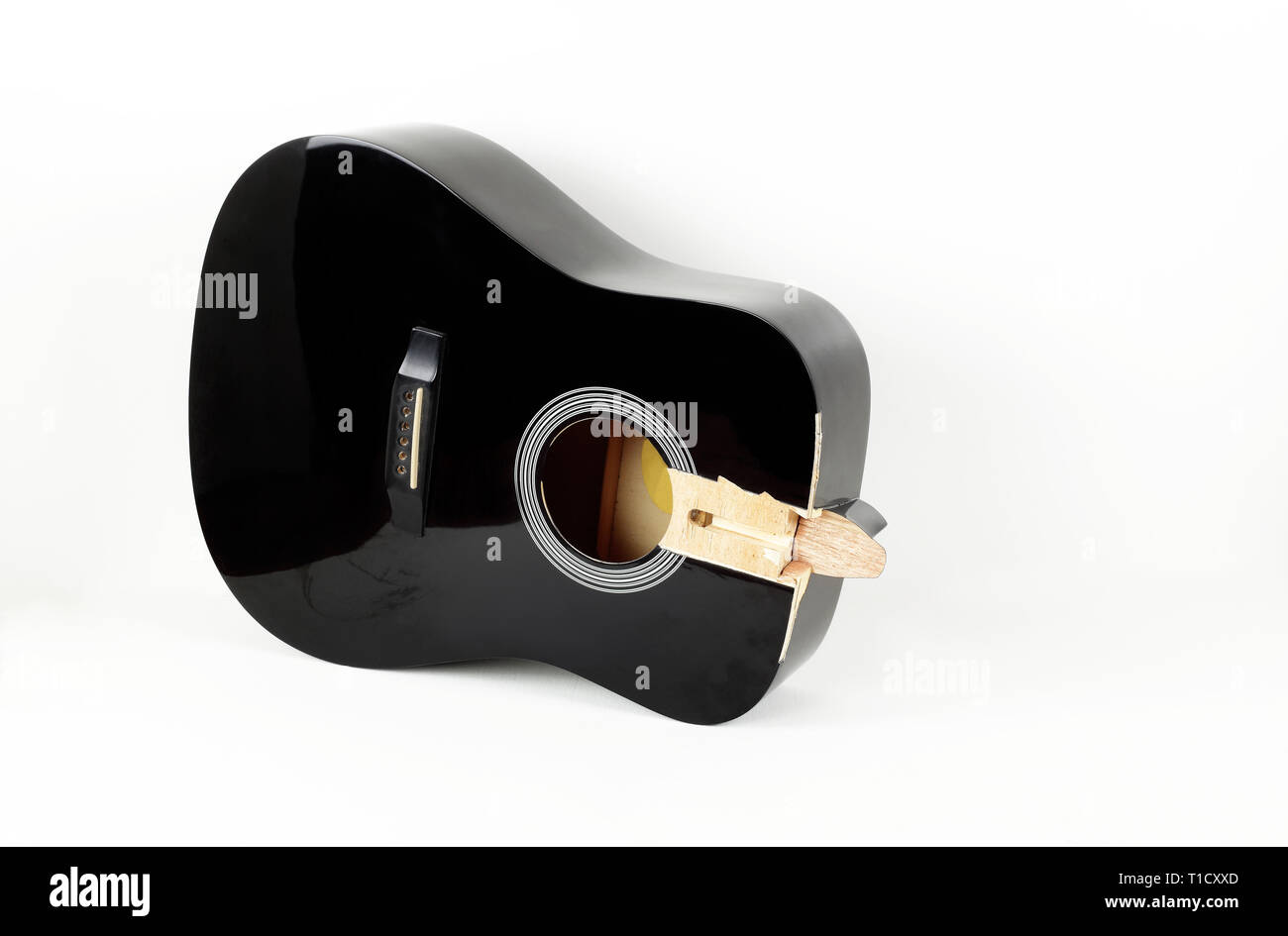 Guitar repair and service broken sound board acoustic guitar top view