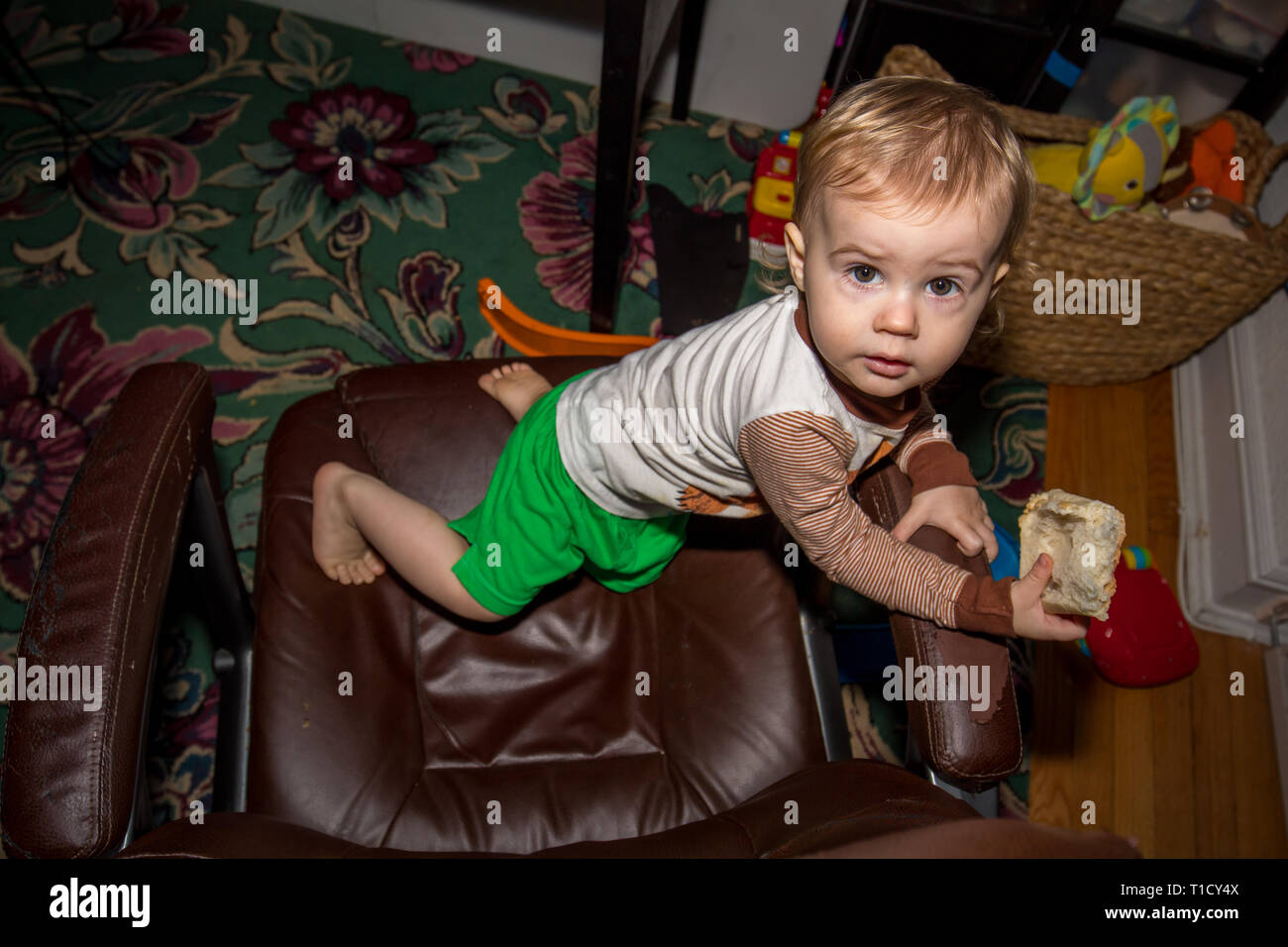 My son growing up and playing Stock Photo