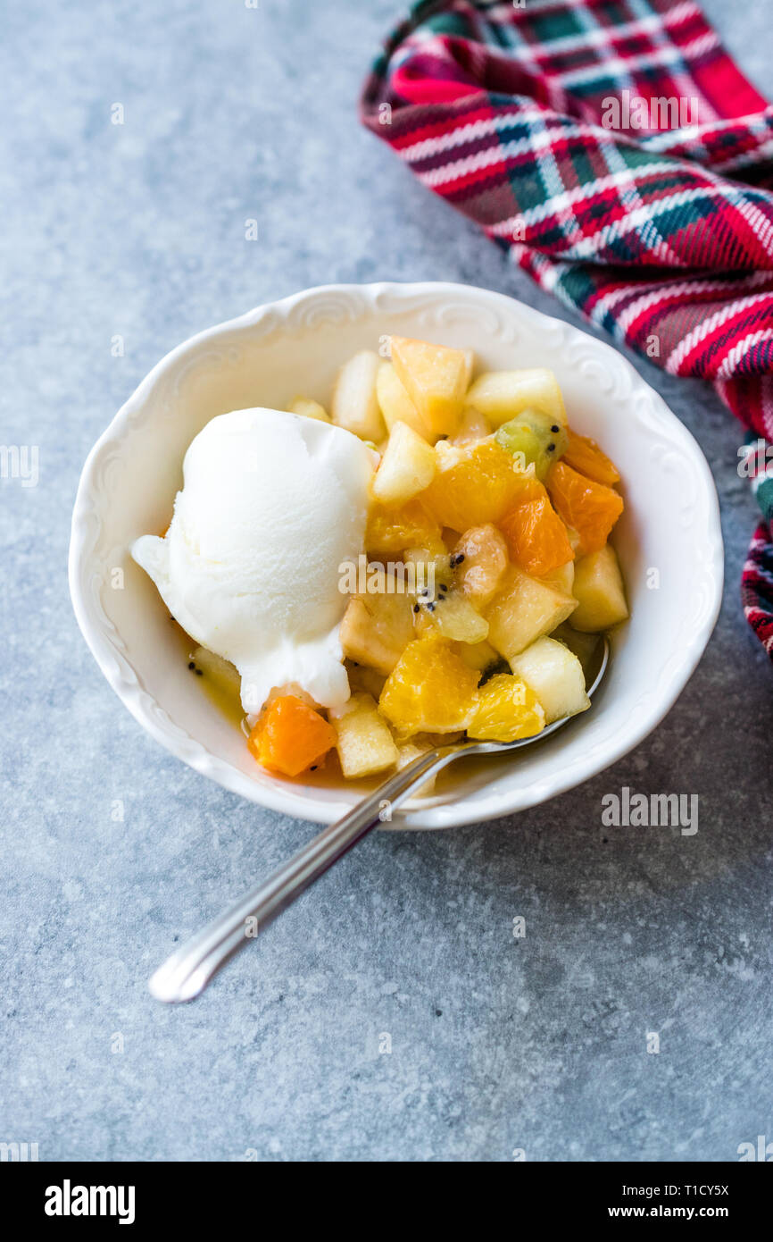 Fruit Salad With Vanilla Ice Cream In Ceramic Bowl Ready To Eat Stock Photo Alamy