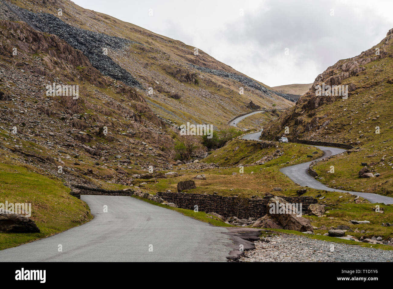 The impressive Honister Pass in the Lake District National Park,Cumbria,England with its winding roads and rugged terrain Stock Photo