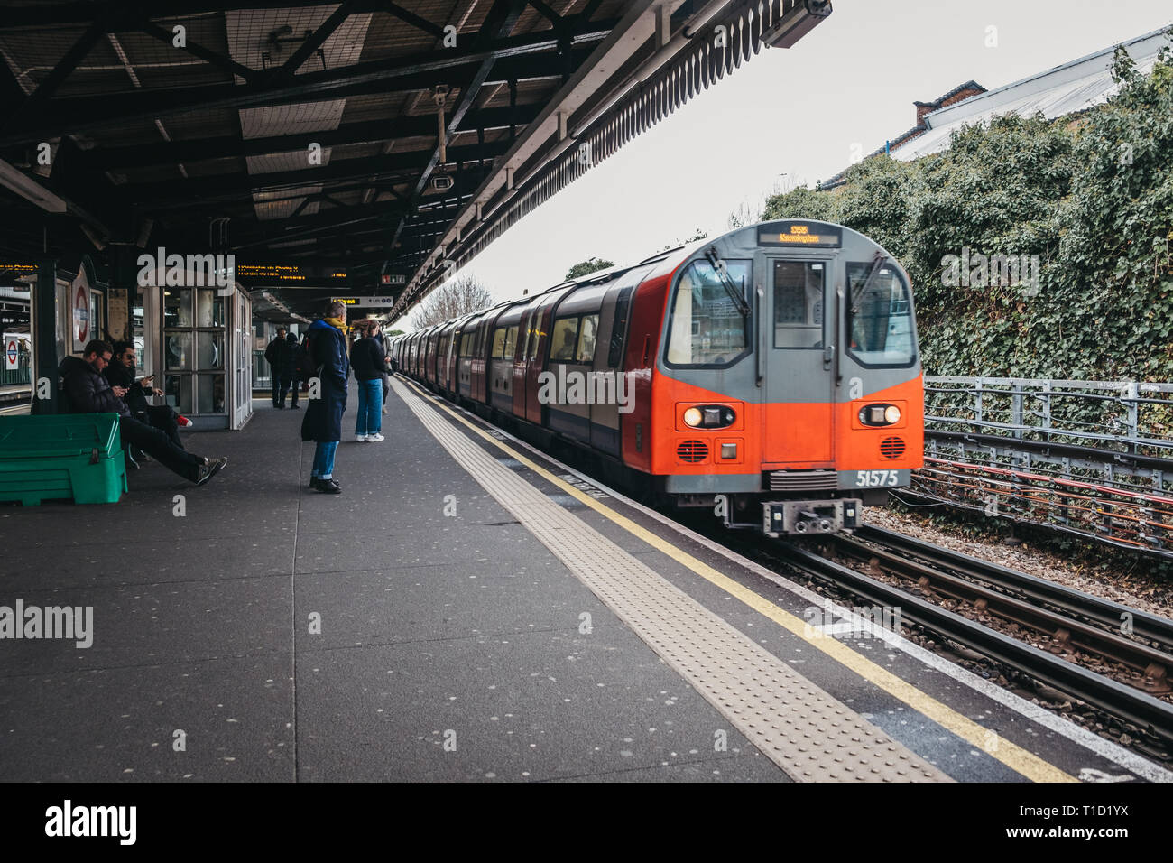 London, UK March 16, 2019 London Underground train arriving at an