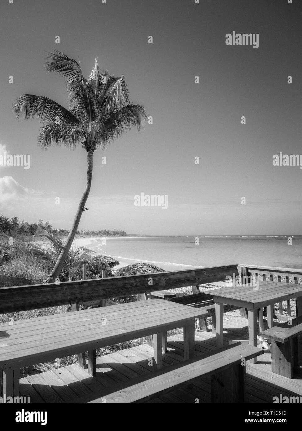 Black and White Landscape of Coastline, Tippy's Restaurant and Beachside Bar, North Palmetto Point, Eleuthera, The Bahamas. Stock Photo