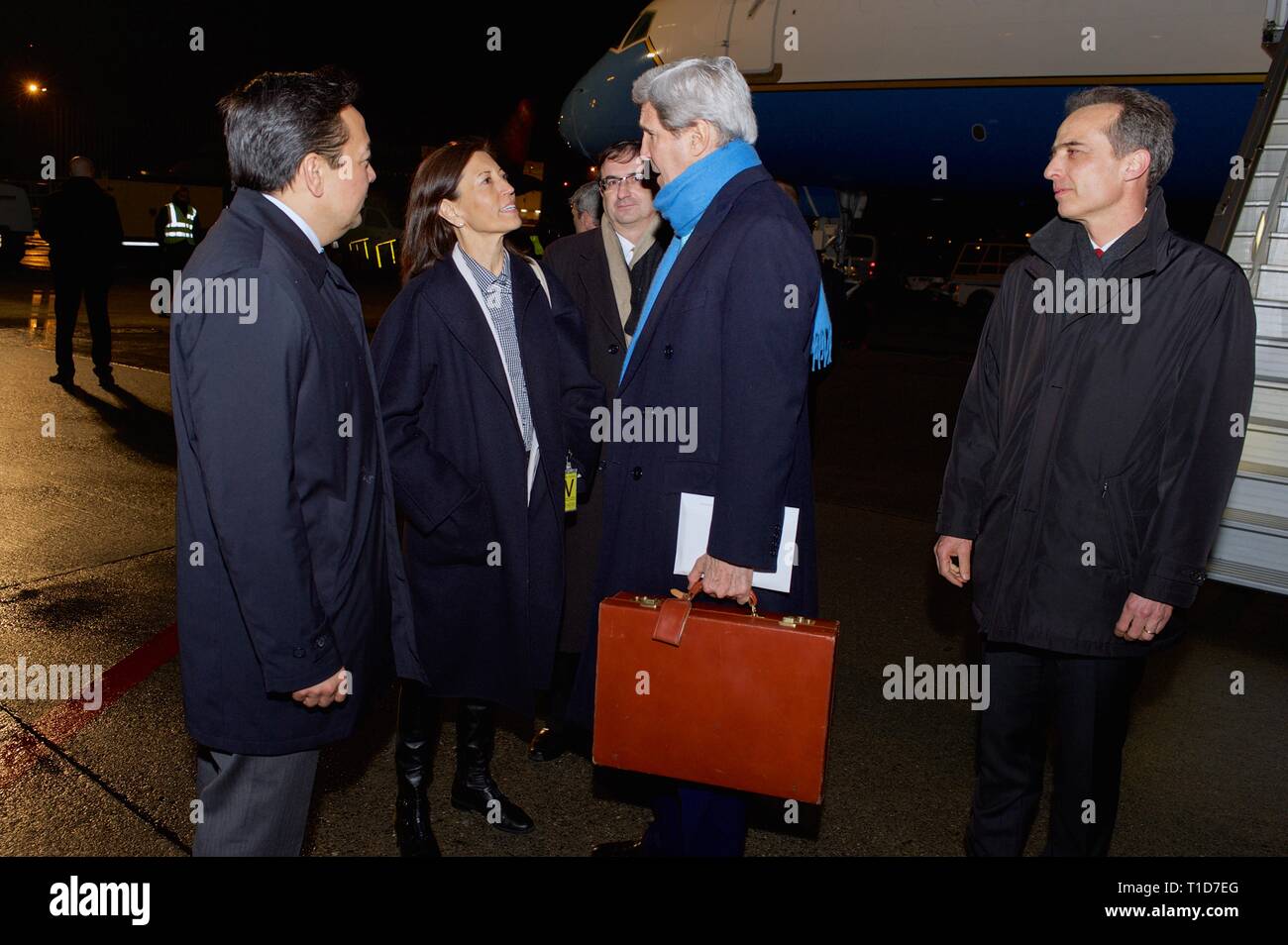 U.S. Secretary of State John Kerry speaks with U.S. Ambassador Pamela Hamamoto, Permanent Representative to the United Nations in Geneva, and U.S. Amb Stock Photo