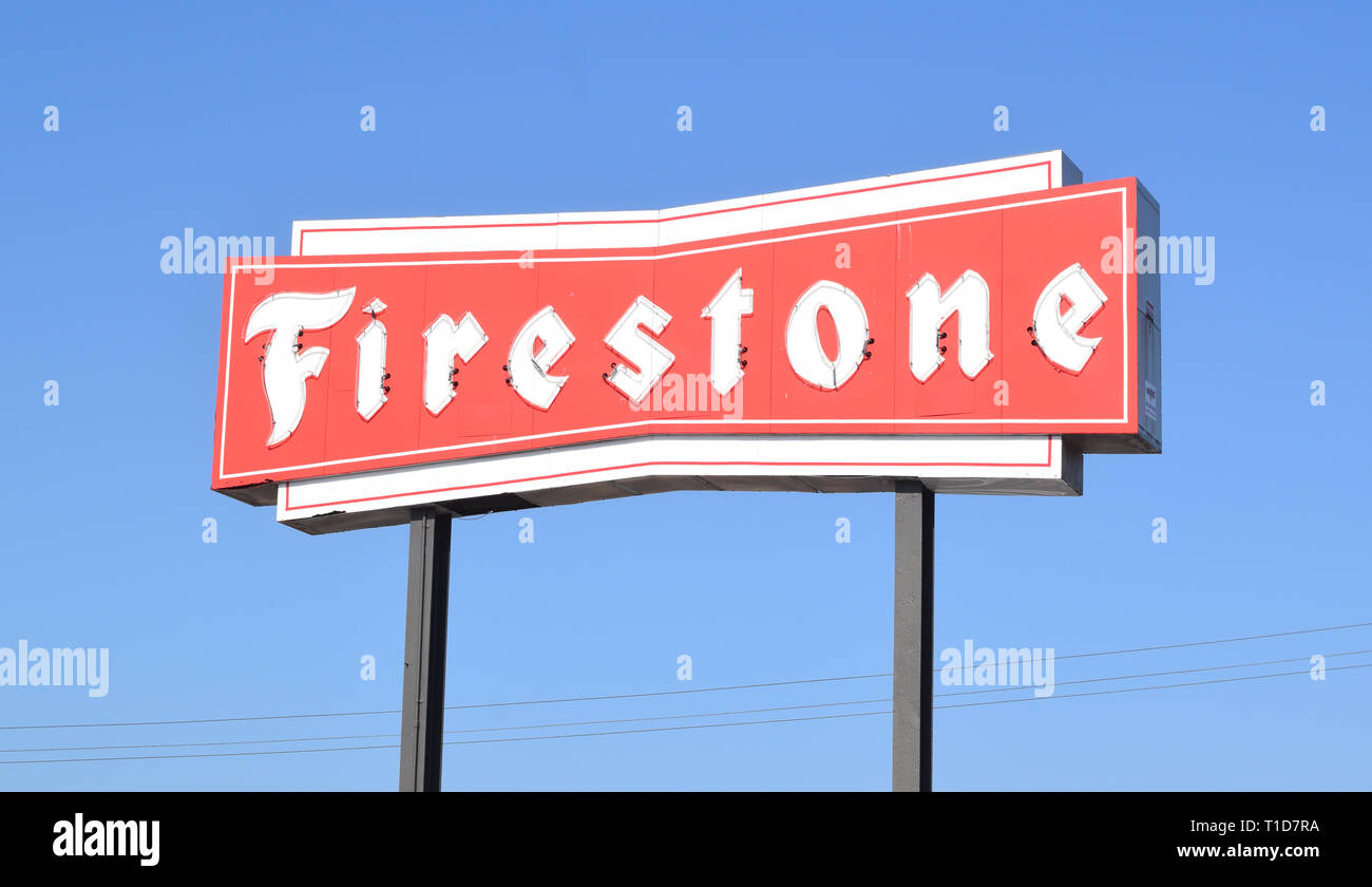 Firestone Tire store sign in Winter Haven Florida Stock Photo