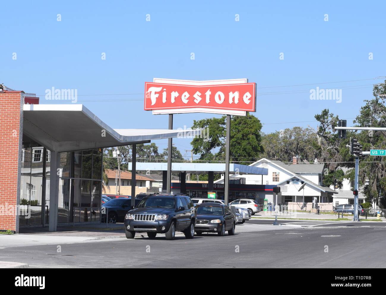 Firestone Tire store sign in Winter Haven Florida Stock Photo