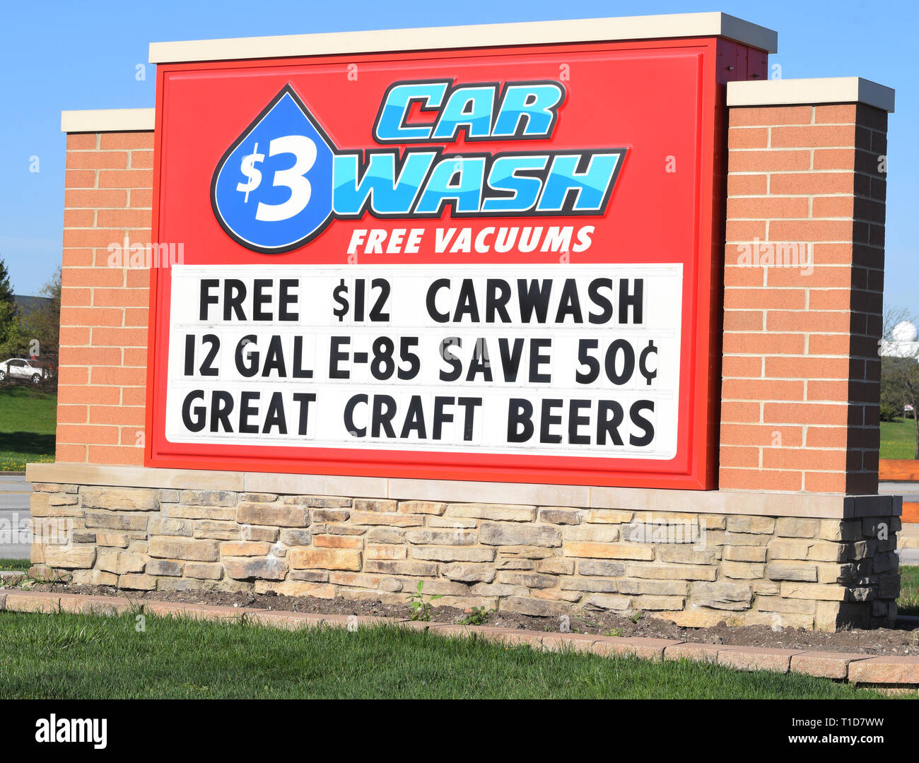 Car wash sign outside car wash advertising craft beers Stock Photo