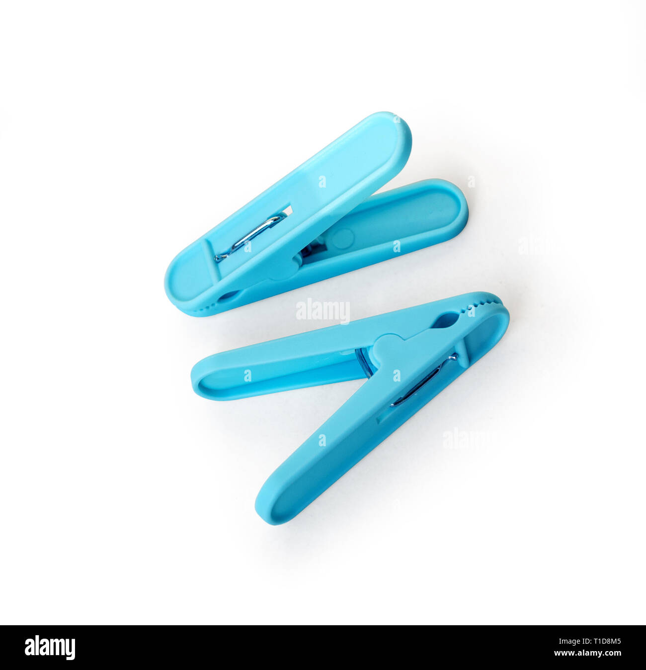 Blue plastic clothespin isolated on white background with clipping path Stock Photo