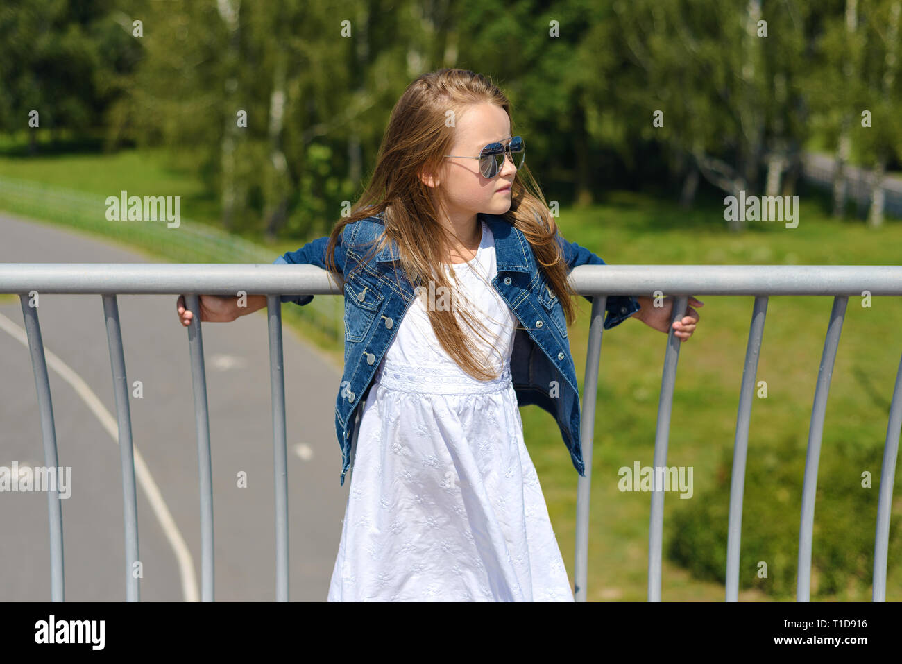 white dress and denim jacket