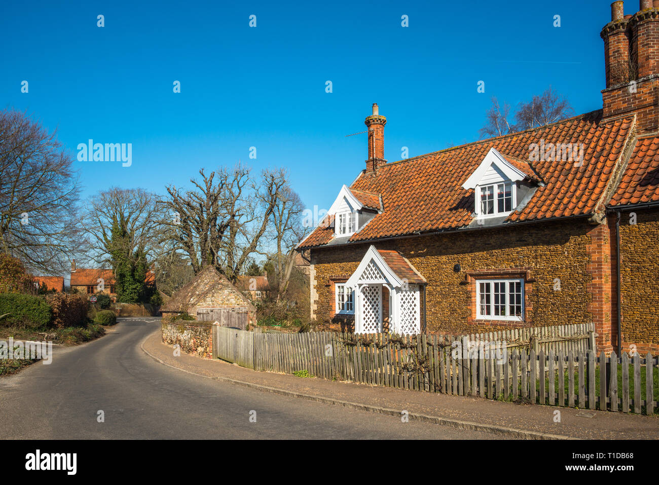 Characterful cottages in the village of Castle Rising in Norfolk, East Anglia, England, UK Stock