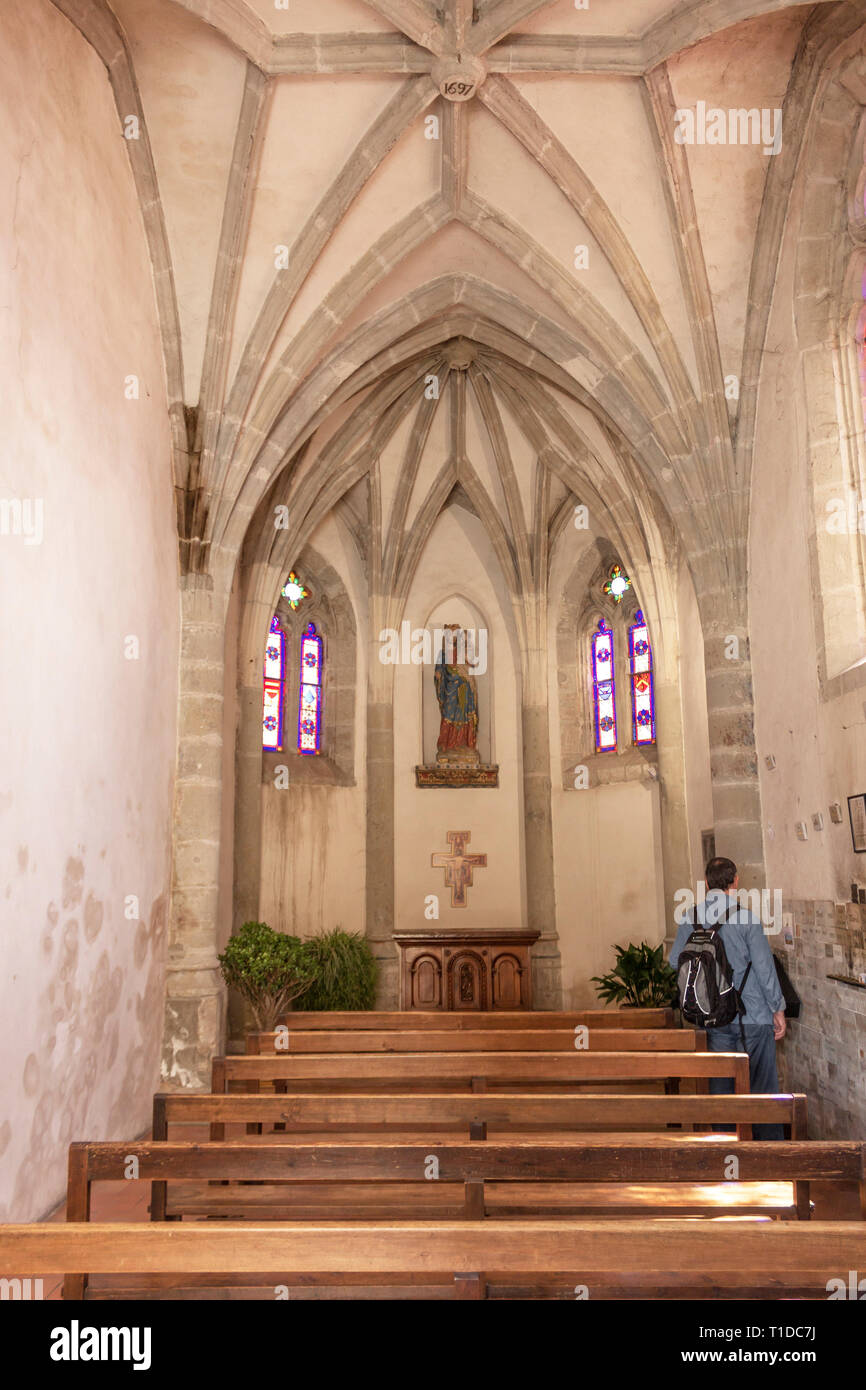 Chapelle Notre Dame de la Santé, Carcasonne, Aude, Occitanie, France. Small chapel situated at the entrance to the Pont Vieux crossing the Aude river Stock Photo