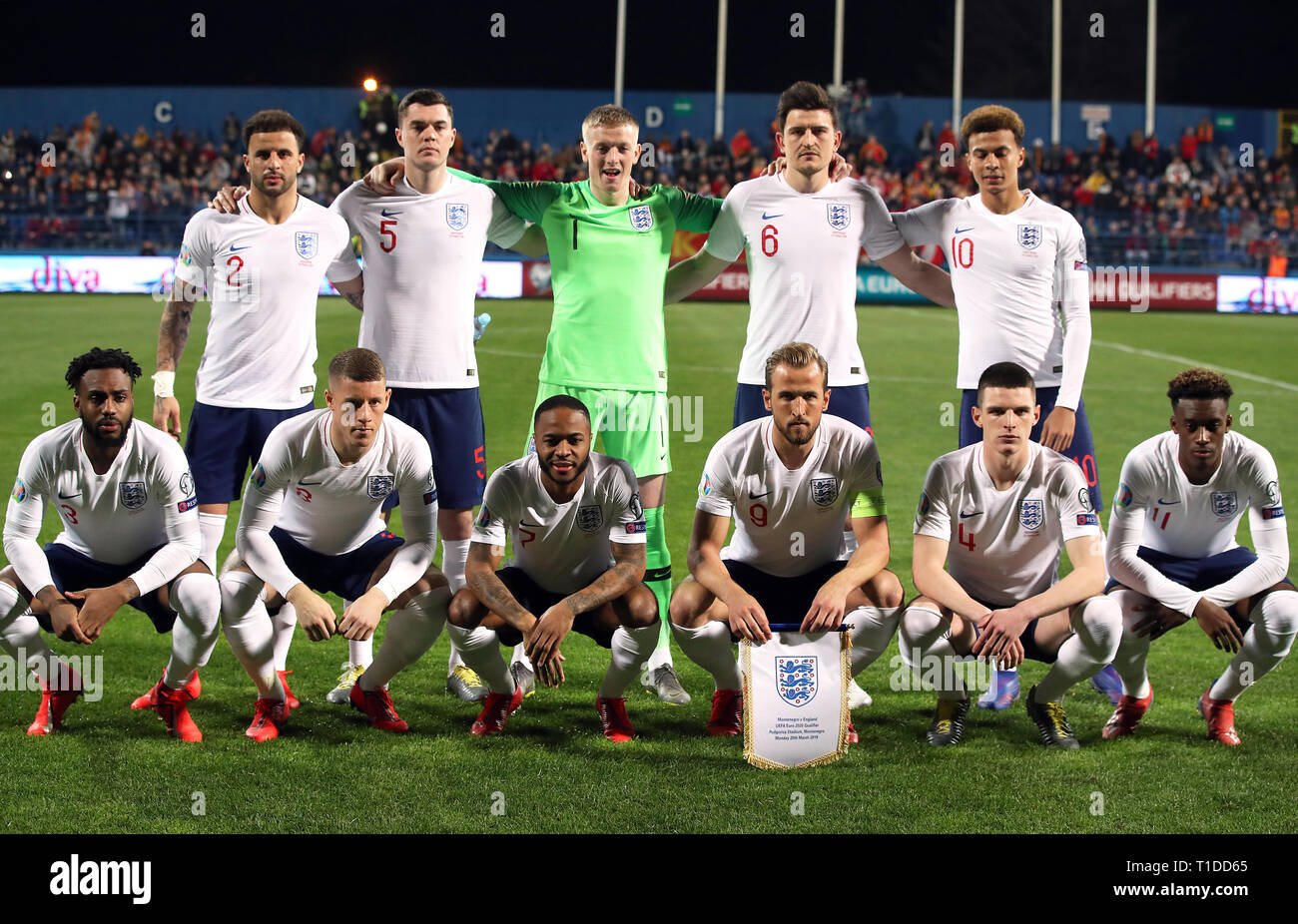 England's (from left to right, back to front) Kyle Walker, Michael Keane, goalkeeper Jordan Pickford, Harry Maguire, Dele Alli, Danny Rose, Ross Barkley, Raheem Sterling, Harry Kane, Declan Rice, and Callum Hudson-Odoi prior to kick-off during the UEFA Euro 2020 Qualifying, Group A match at the Podgorica City Stadium. Stock Photo