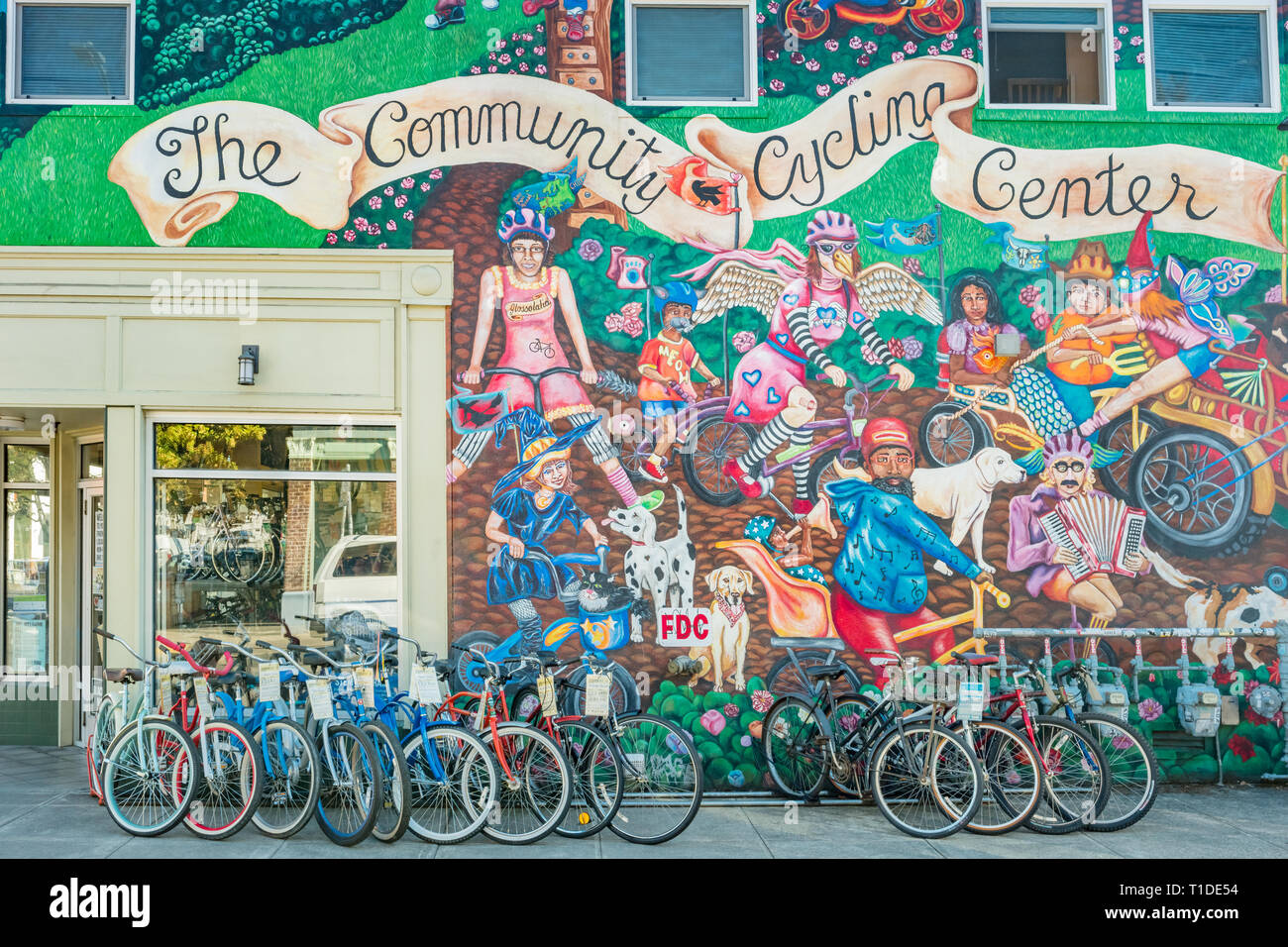 Mural and bicycle store in the Alberta Arts District of Portland Oregon USA Stock Photo