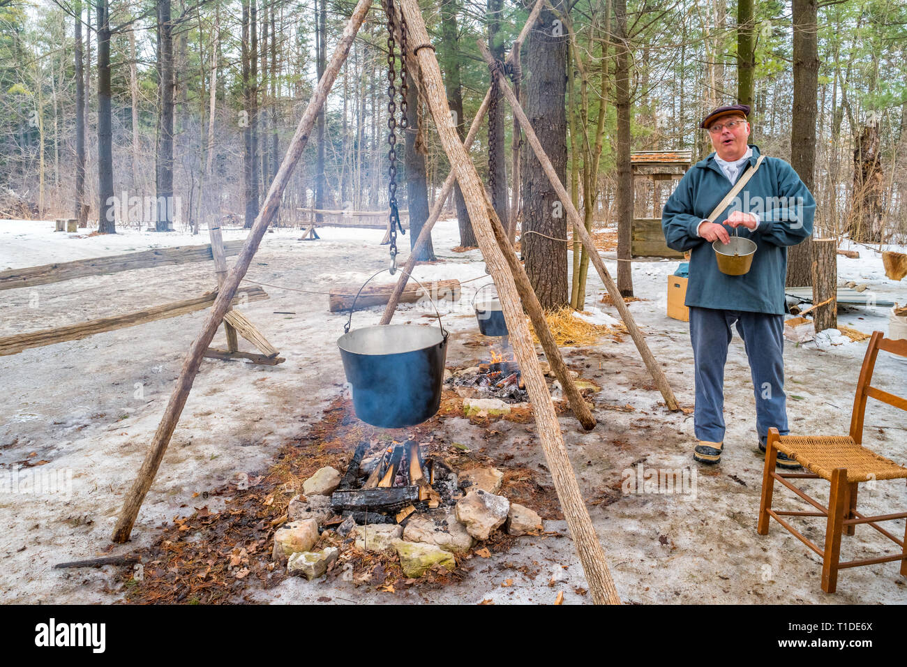 Man in period costume talks about the traditional maple syrup