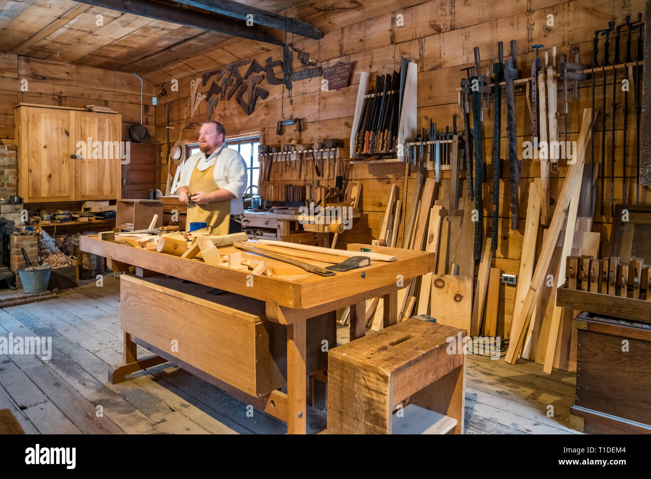 Carpenter works and educates in Westfield Heritage Village near Hamilton, Ontario, Canada Stock Photo