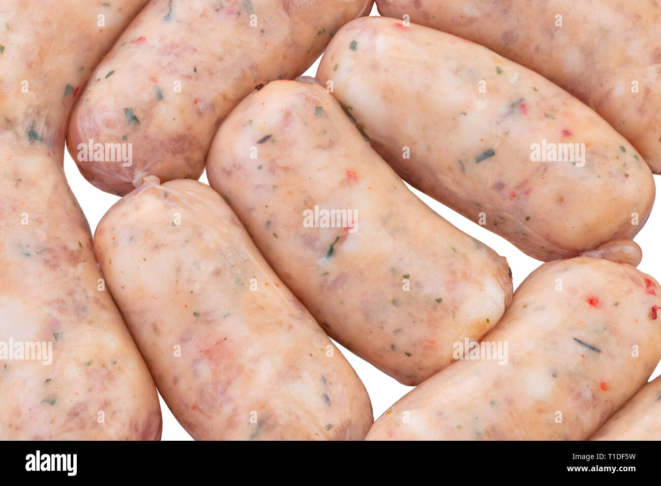 Group of raw sausage isolated on white background. Stock Photo