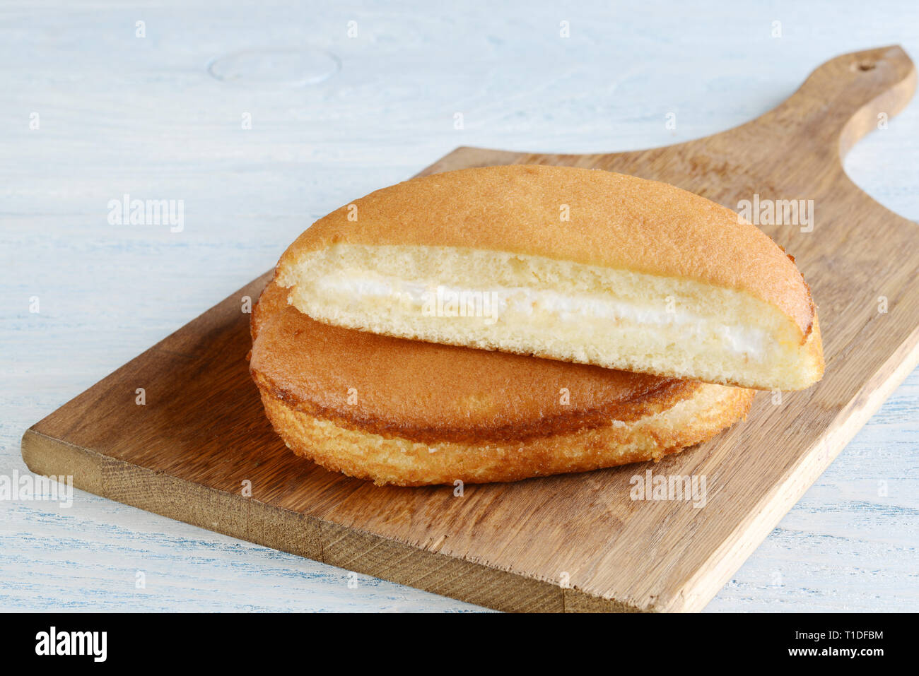 vanilla sponge cake with cream filling Stock Photo Alamy