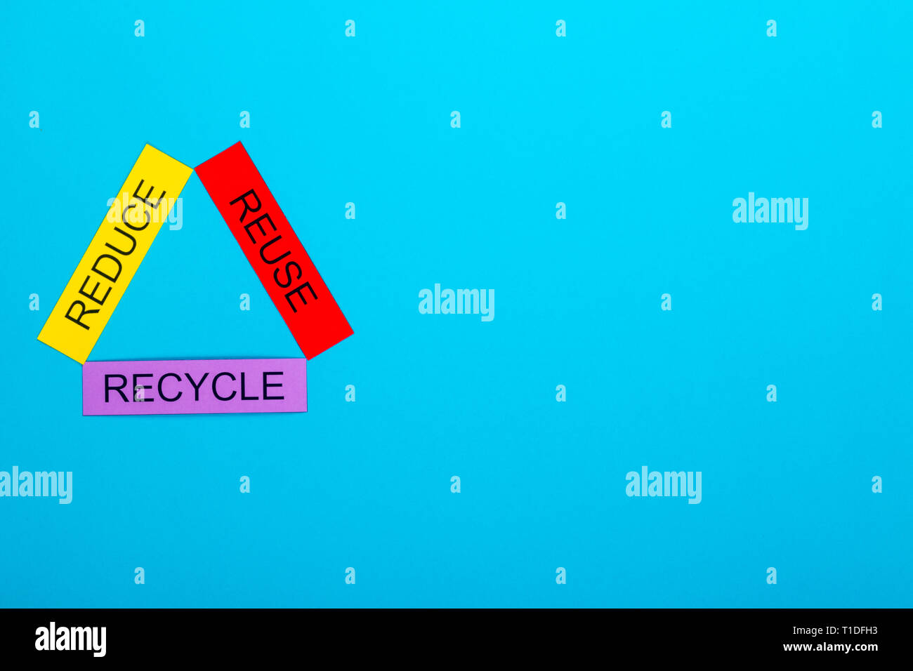 Recycle concept showing reduce, reuse & recycle on a blue background ...