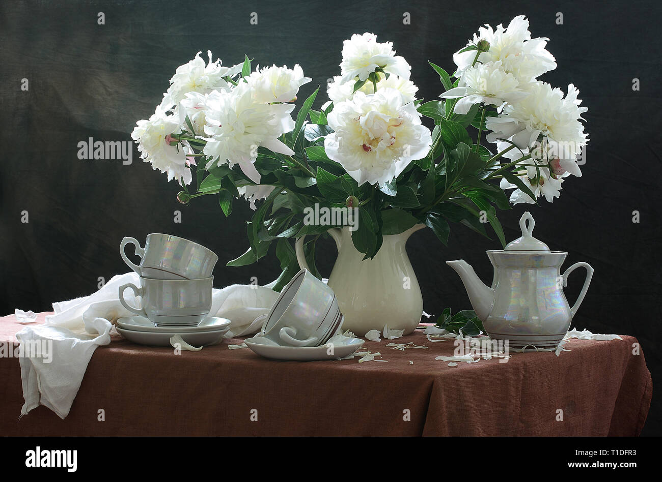 A bouquet of white peonies on the table Stock Photo - Alamy