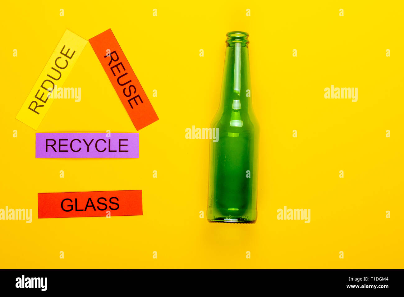 Recycling concept showing reduce, reuse & recycle with glass on a ...