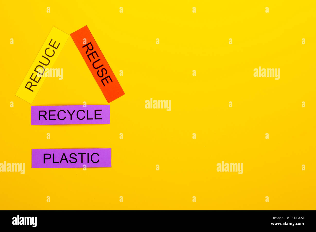 Recycling concept showing reduce, reuse & recycle with plastic on a ...