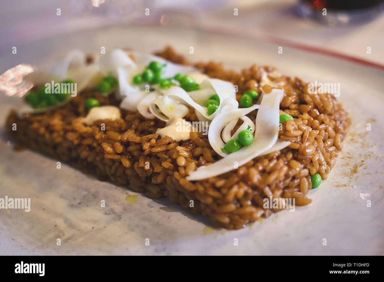 Traditional Spanish dish rice and squid Stock Photo Alamy