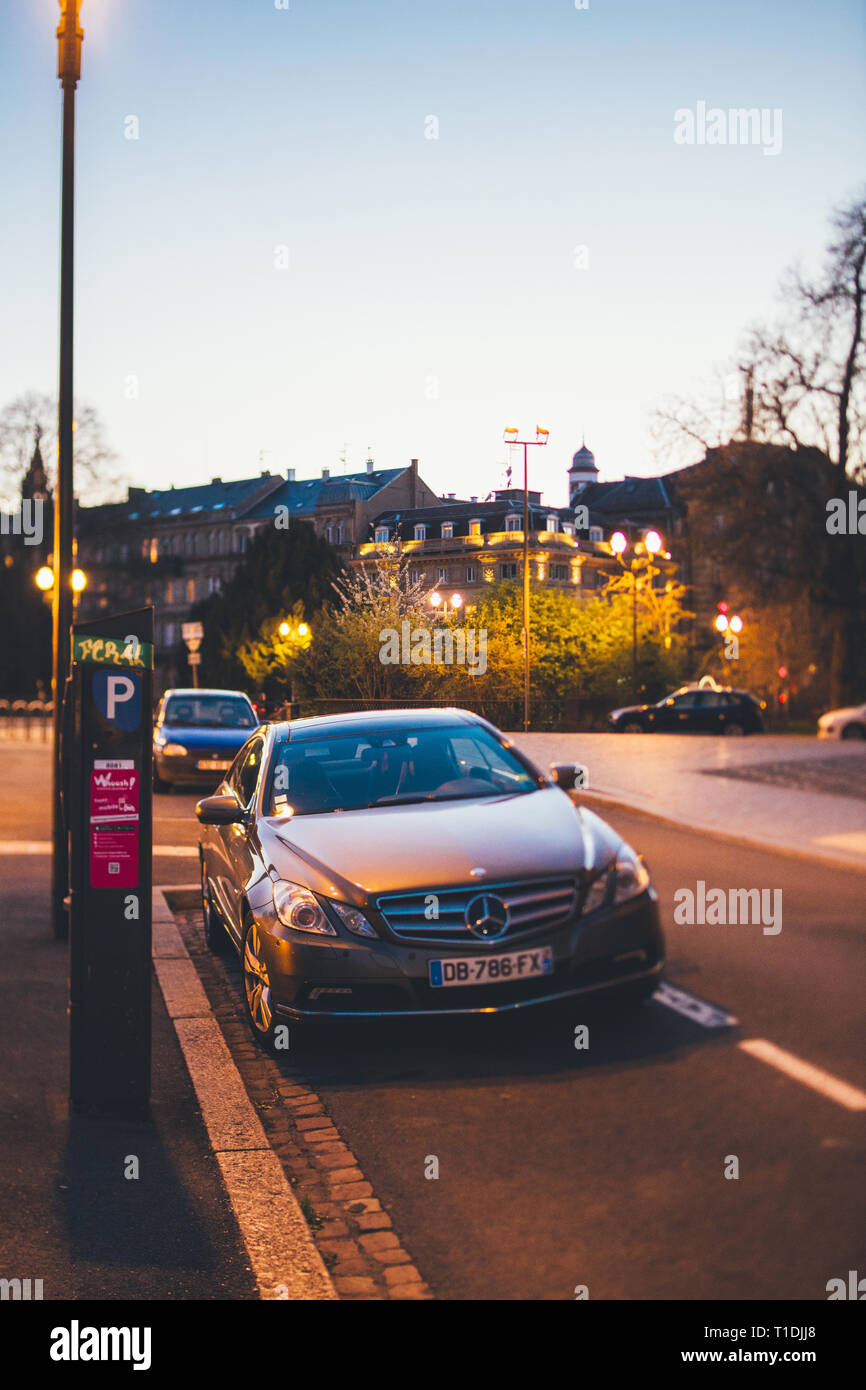 Strasbourg, France - Mar 27, 2017: Luxury Mercedes-Benz E Class coupe parked on a French street at dusk tilt-shift lens used Stock Photo
