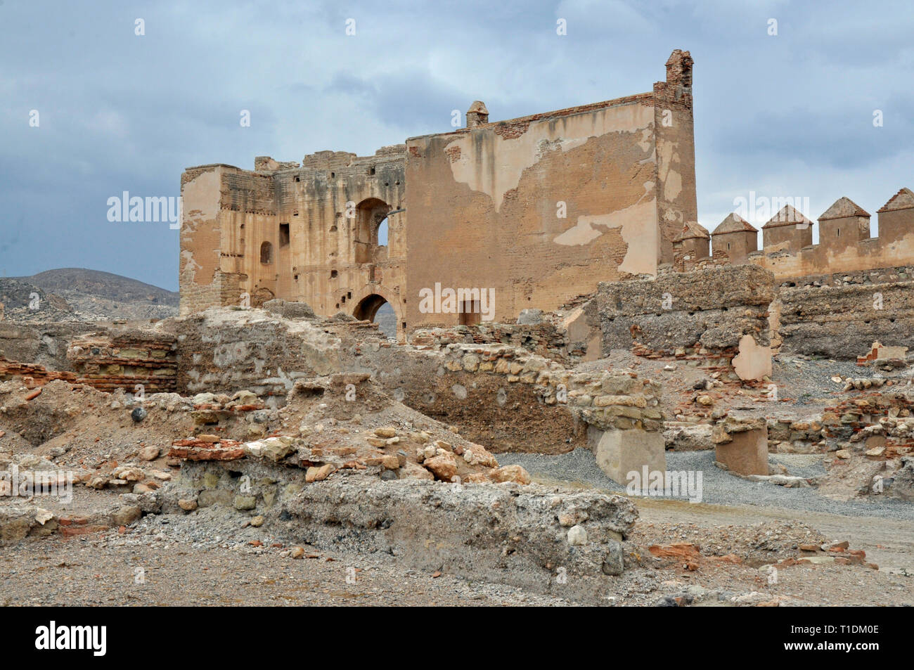 Ruins of old fortress wall inside the Alcazaba of Almeria, the largest fortress built by Arabs in Spain. Stock Photo