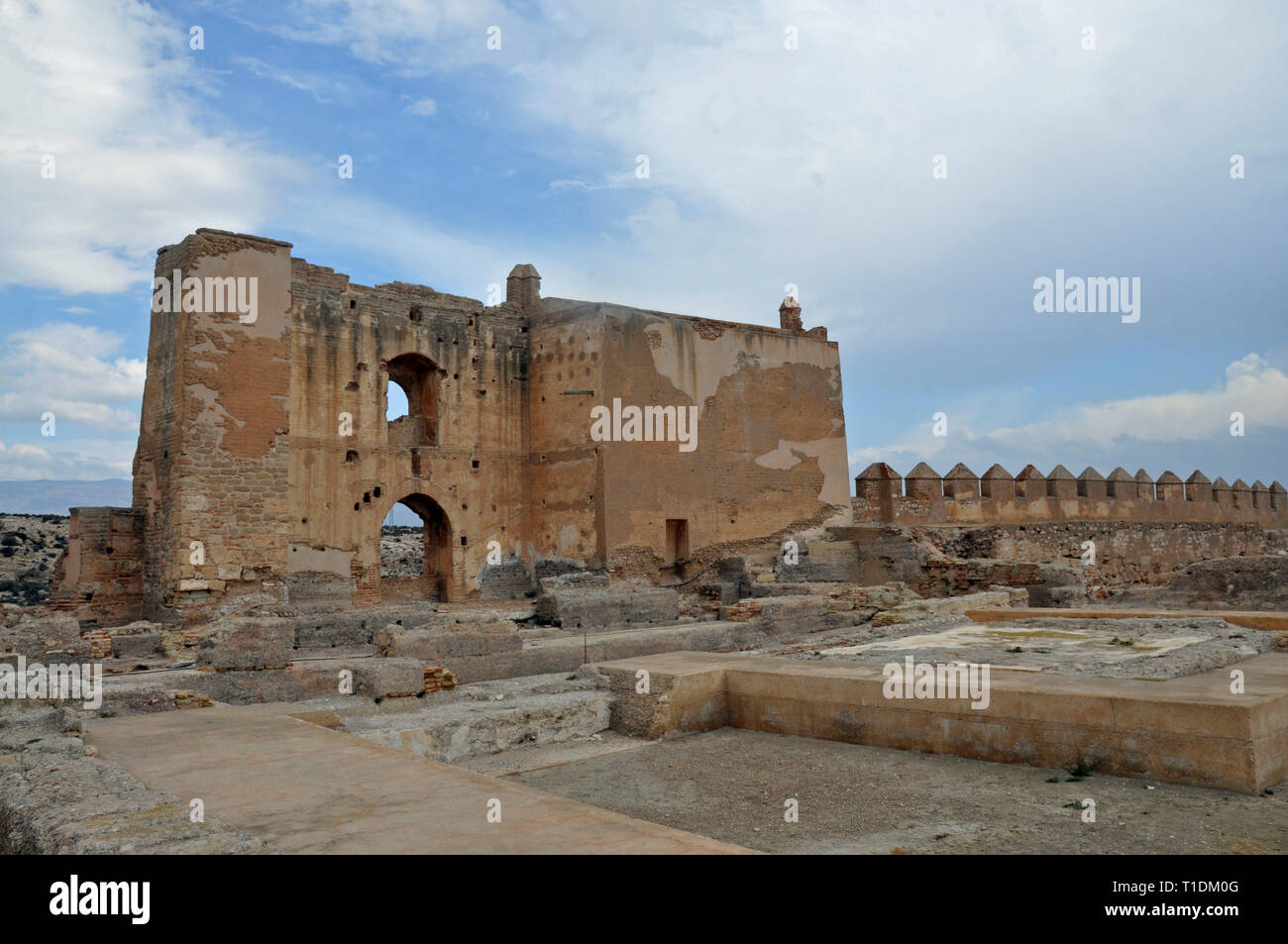 Ruins of old fortress wall inside the Alcazaba of Almeria, the largest fortress built by Arabs in Spain. Stock Photo