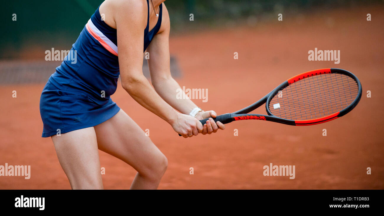 Tennis player holding racket in hands Stock Photo Alamy