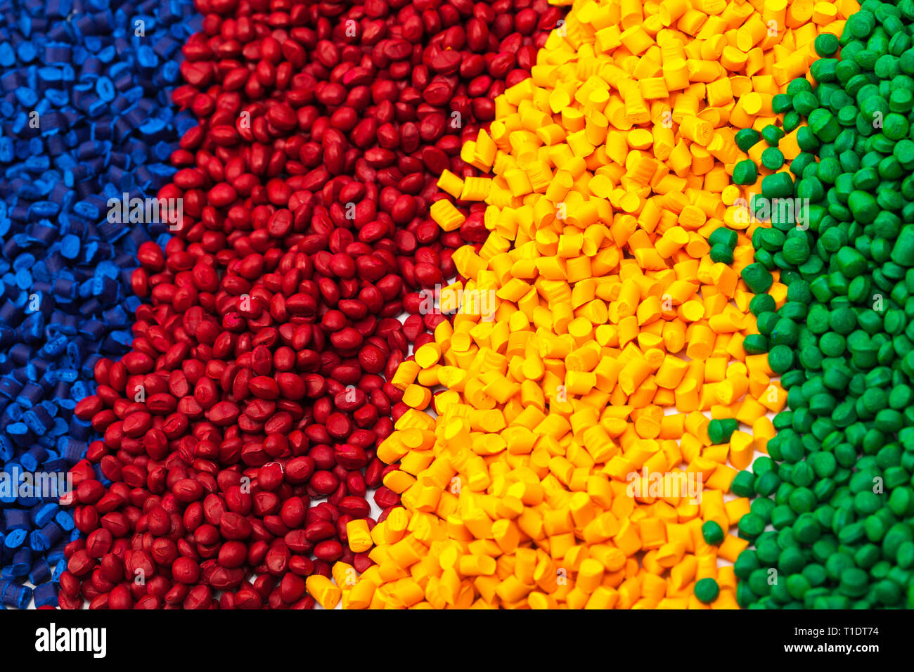 tinted plastic granulate for injection moulding process Stock Photo Alamy
