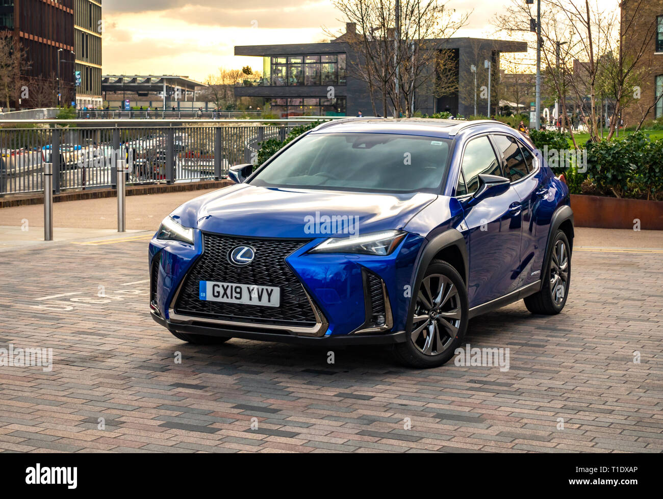 Car front view of a Blue brand new released The Lexus UX Hybrid high-riding soft-roader car parked in Kings Cross, London Stock Photo