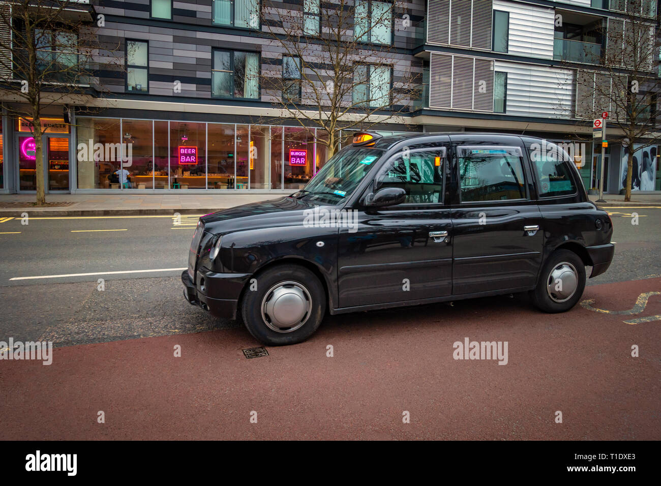 Traditional London Black Cab Taxi Stock Photo