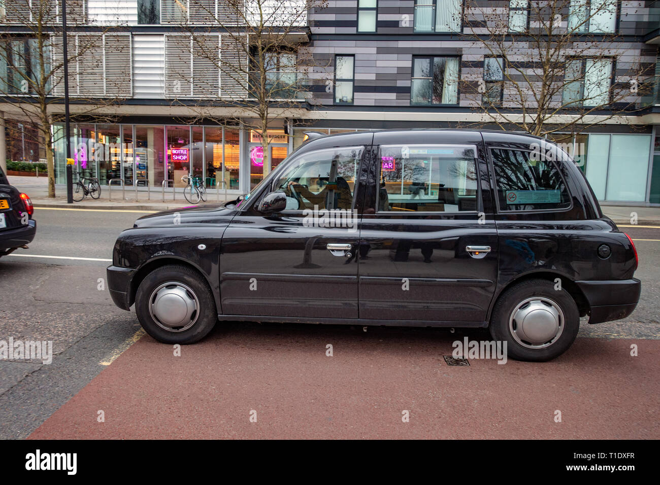 Traditional London Black Cab Taxi Stock Photo