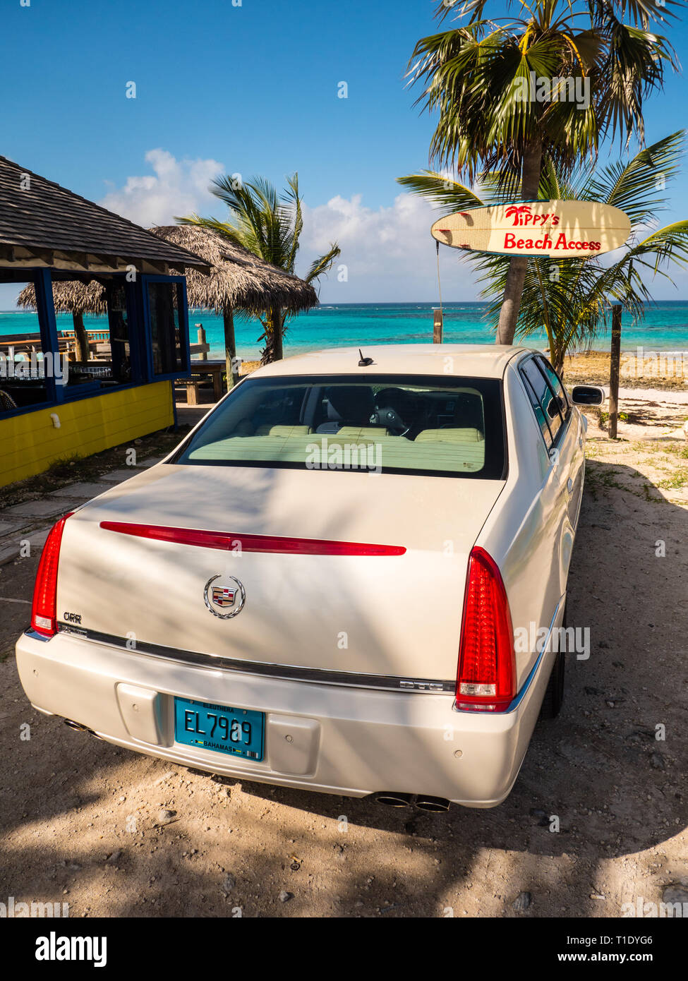 Classic Car Parked outside Tippys Beach Bar, Governors Harbour