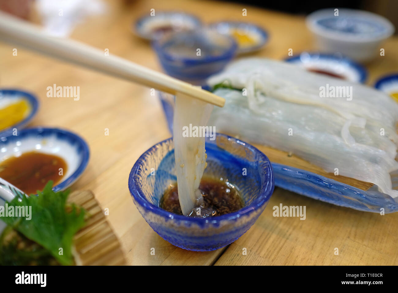 Sashimi Squid in traditional japanese restaurant in Hokkaido, Japan