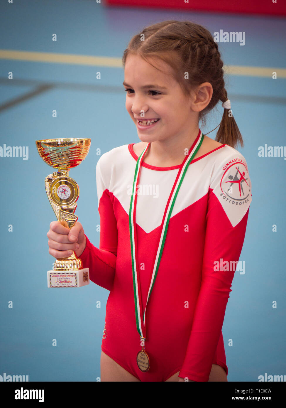 Verona, Italy - March 17, 2019: Award ceremony at the end of a junior women's artistic gymnastics competition. Stock Photo