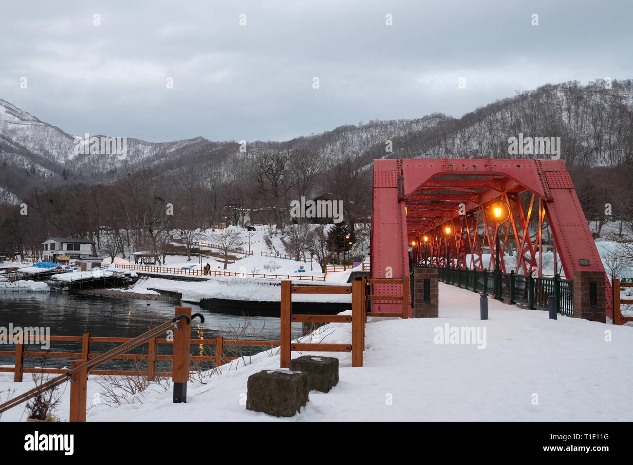 the red bridge in Lake Shikotsu, Hokkaido, Japan Stock Photo