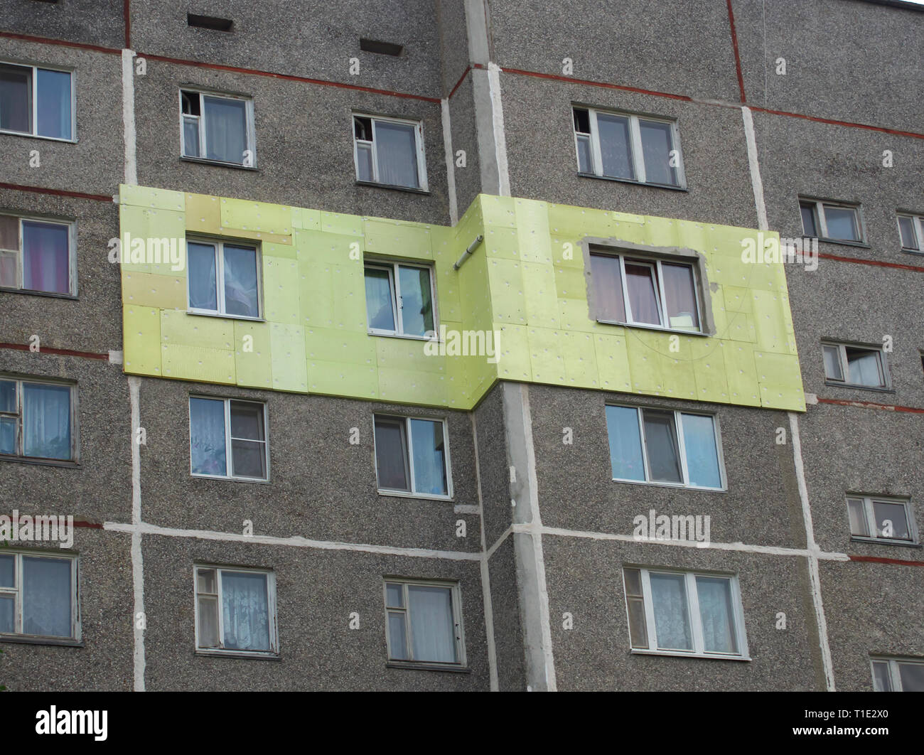 Picture of Insulation of the exterior walls of apartments in a high-rise building ...