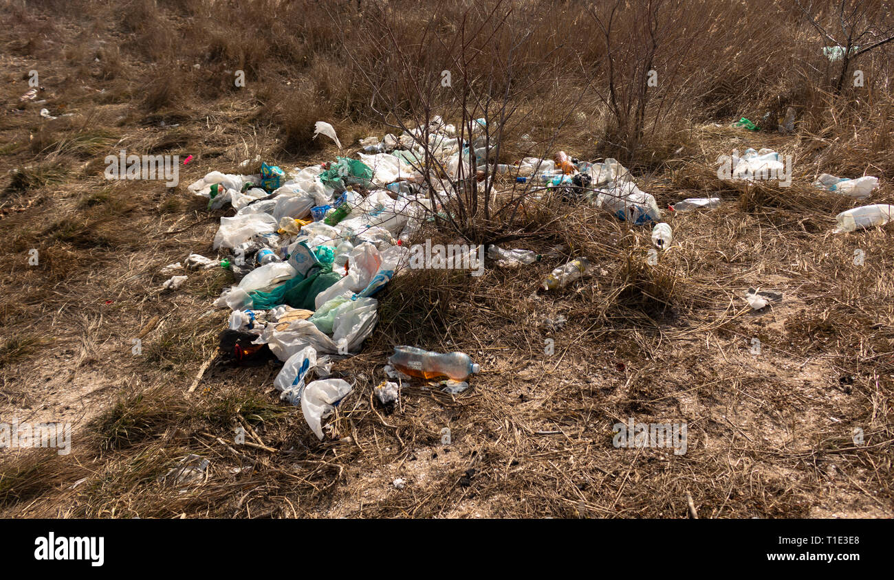 Fishing nylon net on the sand. Garbage on the beach. Dirty sea shore.  Environmental pollution. Save the Planet. Ecological problem. Nature theme.  Stock Photo