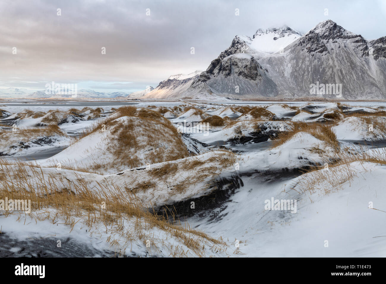 Black Sand Dunes, Snow and Vestrahorn, Iceland Stock Photo