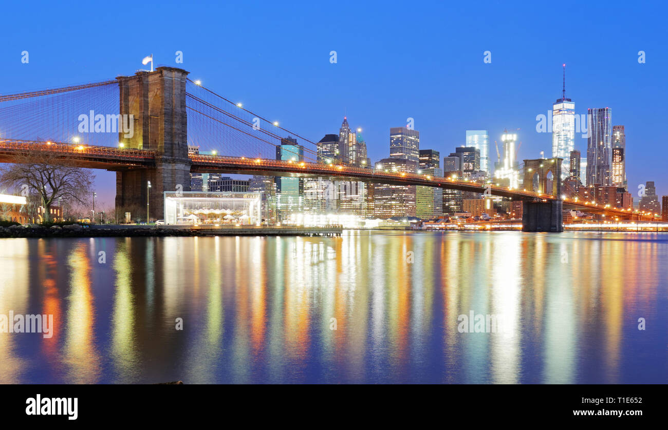 Brooklyn Bridge over East River at night in New York City Manhattan ...
