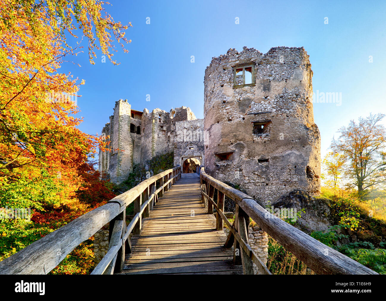 Beautiful Slovakia landscape at autumn with Uhrovec castle ruins at sunset Stock Photo