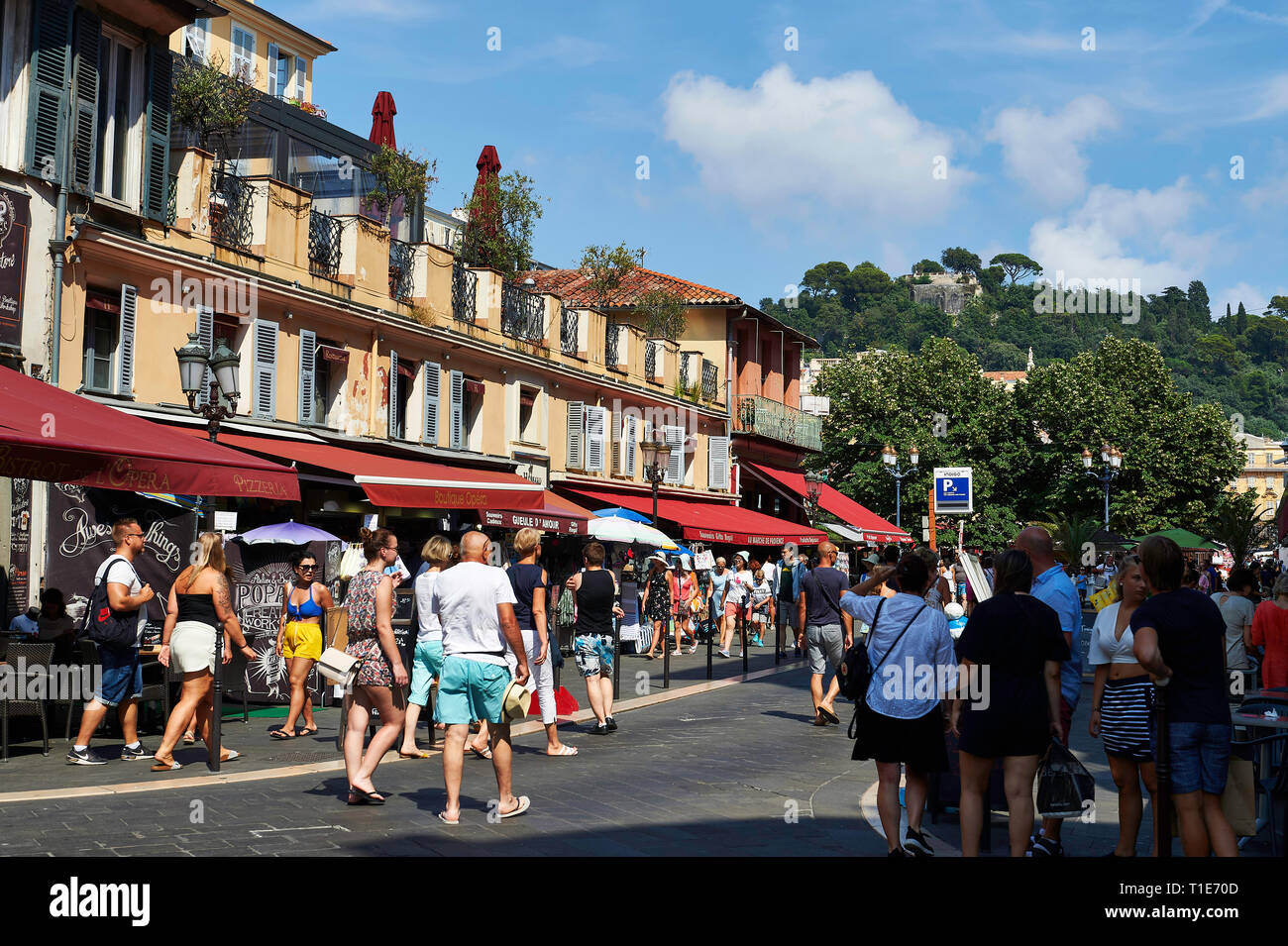 Nice (south-eastern France): “rue Saint-Francois de Paule” street in the Old City of Nice. Tourists and shops *** Local Caption *** Stock Photo