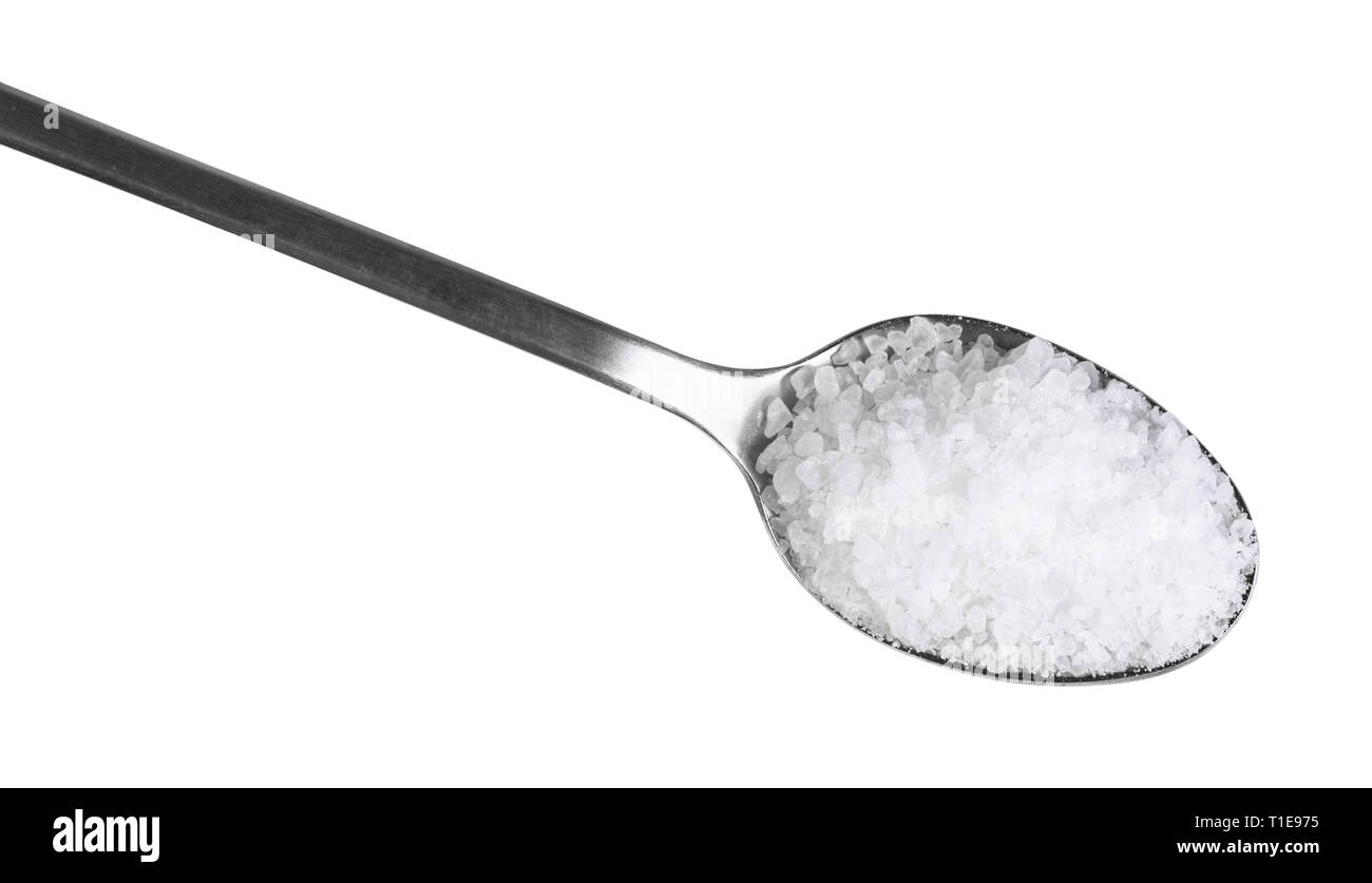 top view of steel teaspoon with coarse grained Sea Salt close up
