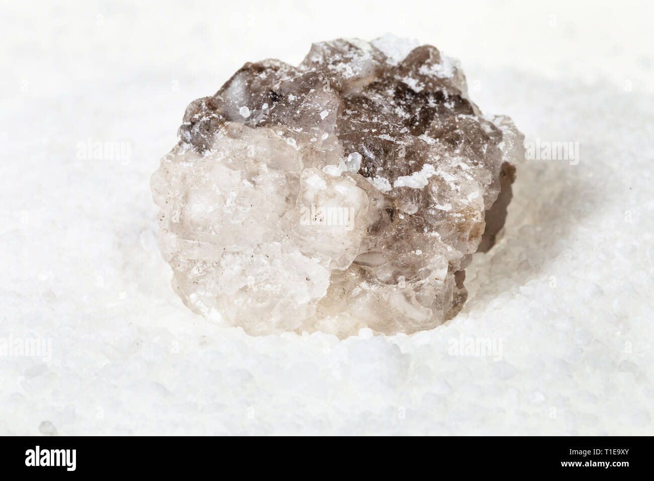 rough natural Halite mineral in grained Rock Salt close up Stock Photo