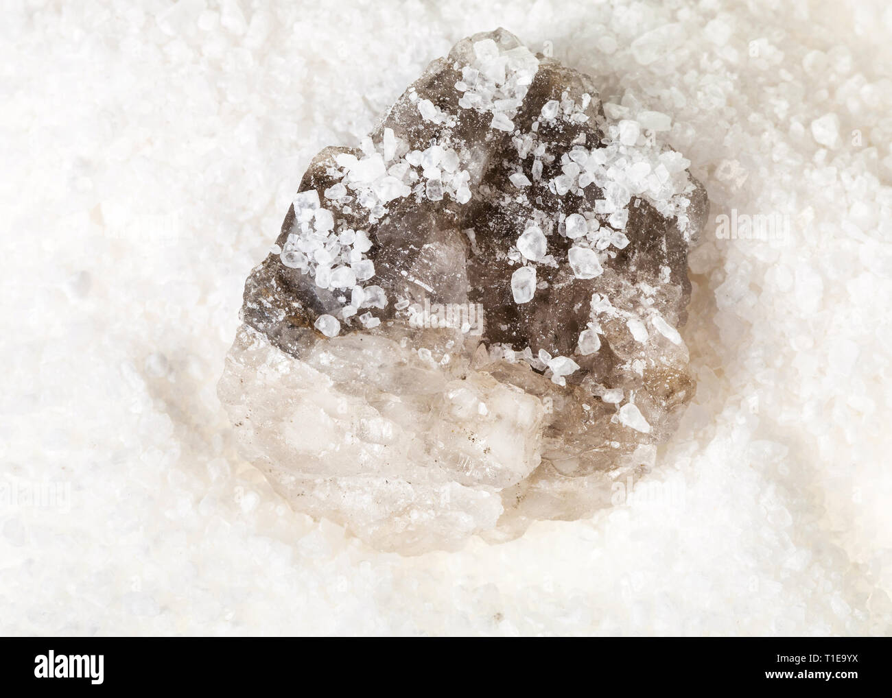 top view of raw Halite mineral in grained Rock Salt close up Stock