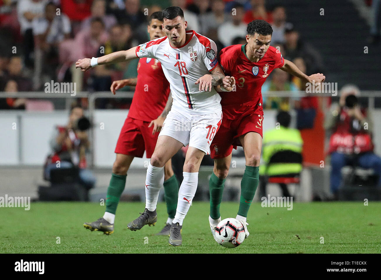 Nemanja Radonjic of Serbia (L) vies for the ball with Pepe (Kepler Laveran de Lima Ferreira ComM)  of Portugal (R) during the Qualifiers - Group B to Euro 2020 football match between Portugal vs Serbia. (Final score: Portugal 1 - 1 Serbia) Stock Photo
